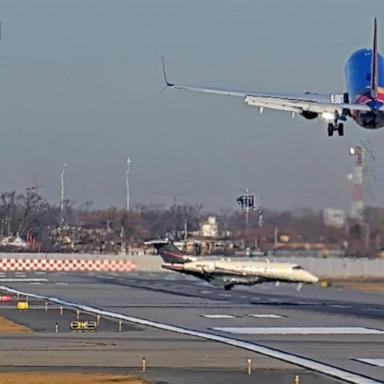 VIDEO: Southwest plane has close call with business jet while landing in Chicago 