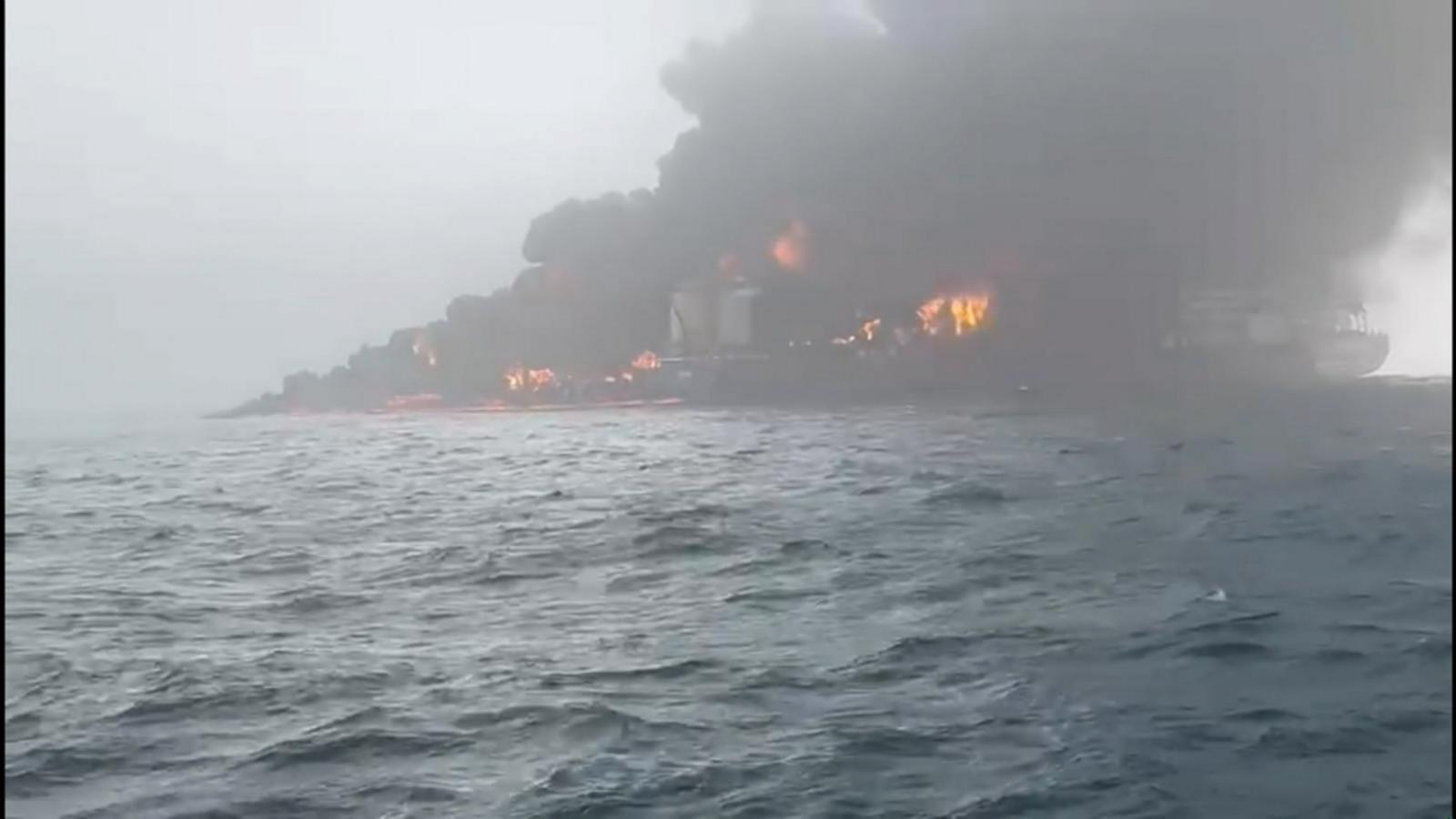 Container ship collides with anchored US oil tanker sparking inferno ...