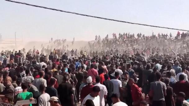 On the brink of famine, thousands scramble for food in Gaza