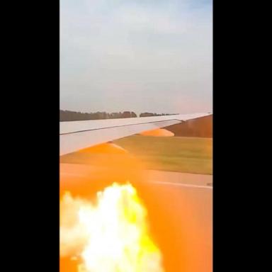 VIDEO: United Airlines flight aborts takeoff after flames shoot from wing of plane