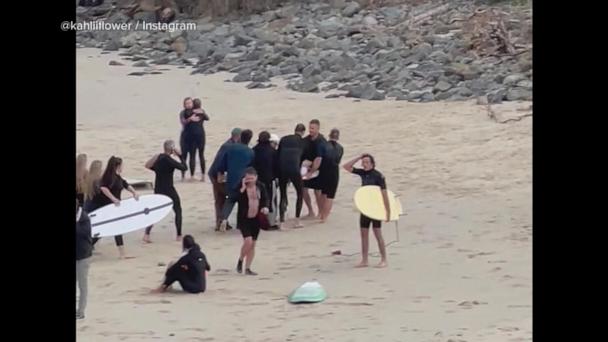 Video appears to show shark chasing boy in waters of Australian beach