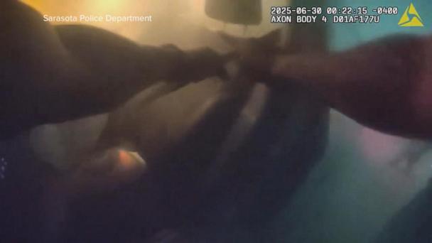 Body camera video captures dramatic rescue from burning car in Florida