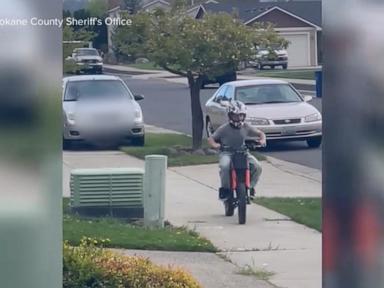 The Metal Predator on a Quiet Suburban Sidewalk