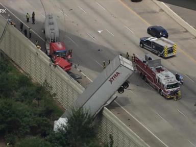 WATCH:  Dangling big rig shuts down major Texas highway for hours