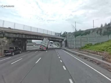 WATCH:  Video shows moment tractor trailer hits overpass