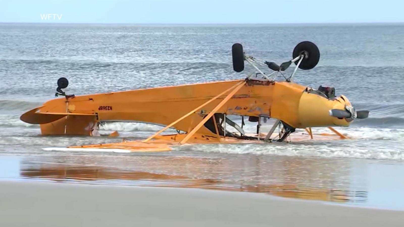 WATCH:  Pilot rescued after banner plane crashes into Florida surf