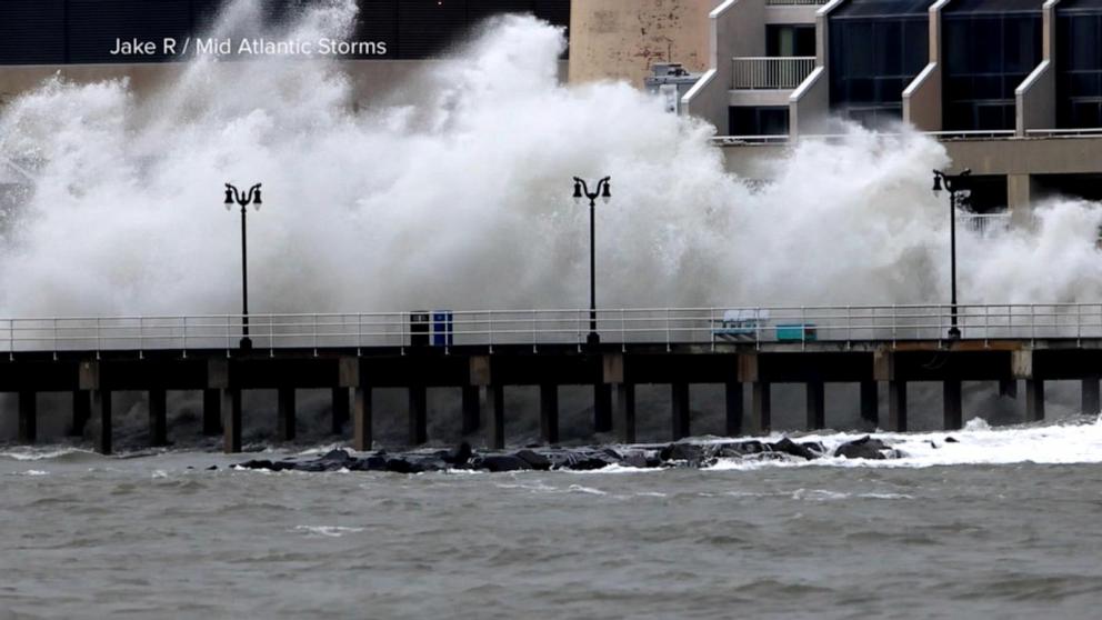 Nor'easter batters East Coast with flooding and power outages