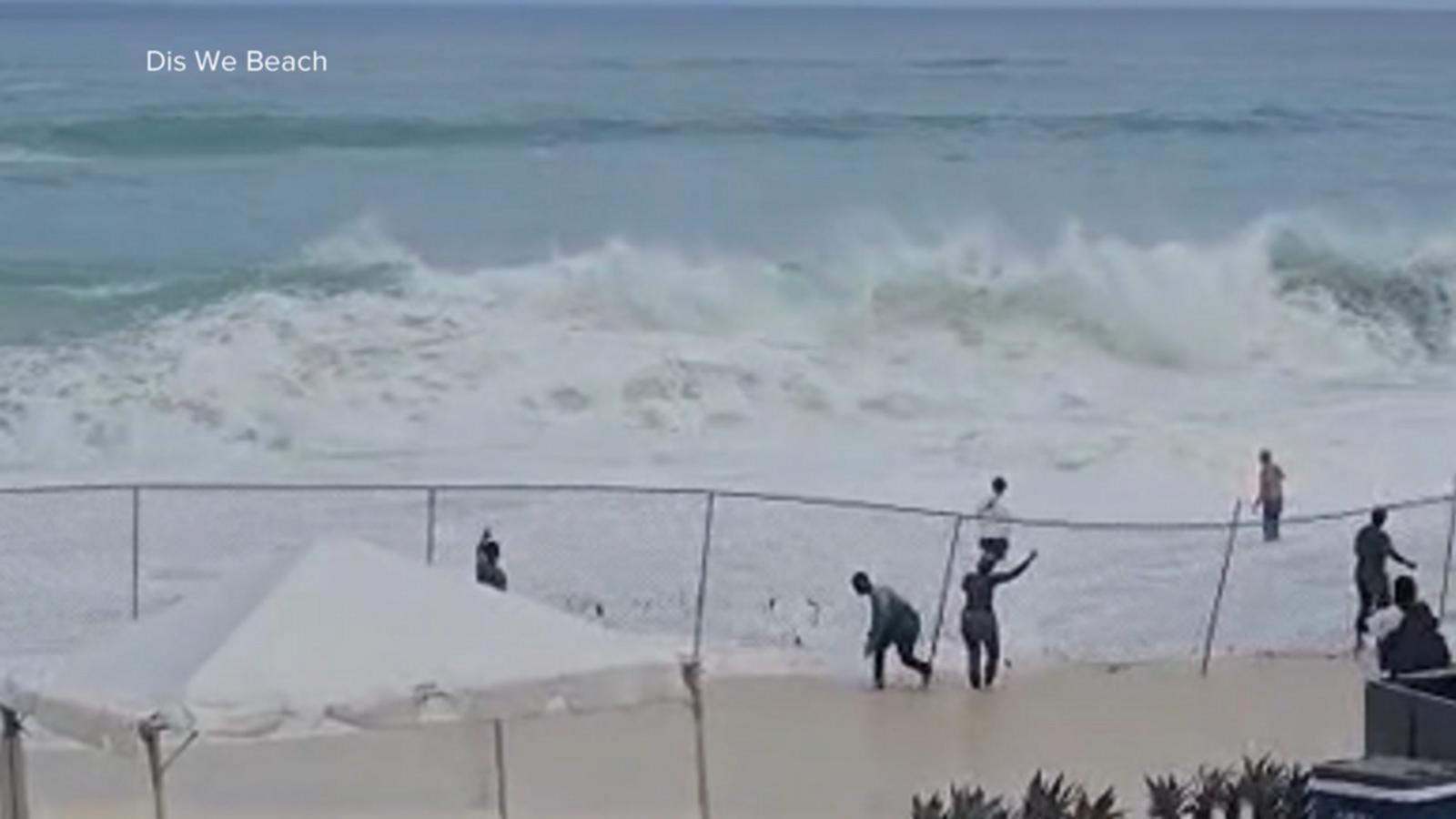 WATCH:  Video shows woman's terrifying rescue from rough surf in the Bahamas
