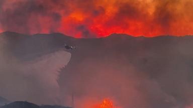 VIDEO: Wildfires explode in the west as cross-country storms slams Northeast