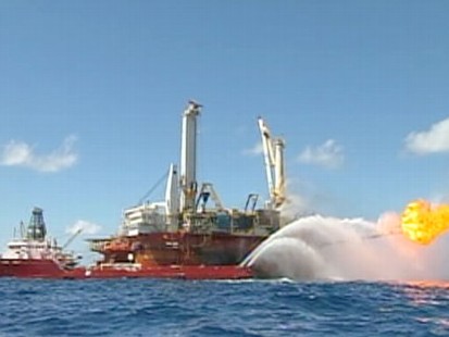 VIDEO: Officials say a new cap could completely contain the oil gushing into the Gulf.
