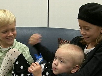 VIDEO: A young cancer survivor misses school to push for action against the disease.