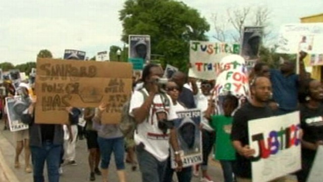VIDEO: Thousands rally to condemn the shooting of the 17-year-old boy.