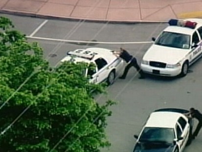 VIDEO: Three men strap a bomb to a bank teller and force him to rob Florida bank.