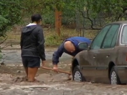 VIDEO: Thinking of his family and a pocket of air kept him alive for hours as he was swept away in his car.