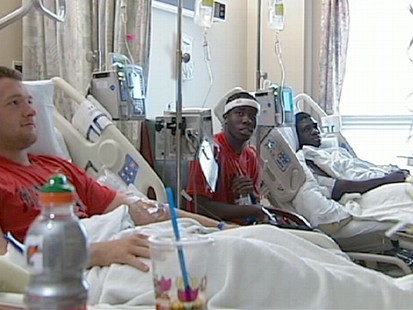 VIDEO; Football Team Lands in Hospital