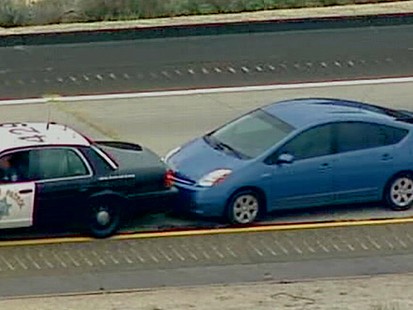 VIDEO: A driver speeds down a San Diego freeway, unable to stop or slow his Prius.
