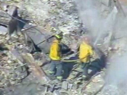 VIDEO: Officials say fire zone still too hot to search; Utility promises answers.