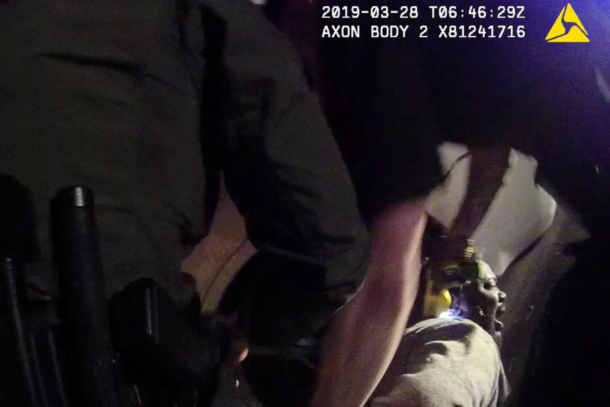 PHOTO: In this image made from a March 28, 2019, body-worn camera video provided by the Austin Police Department in Texas, Williamson County deputies hold down Javier Ambler as one of them uses a taser during his arrest in Austin, Texas. 
