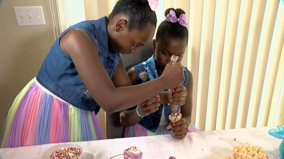 PHOTO: Eleven-year-old Zyaire Hawkins and 9-year-old Char'Les Hawkins in Highlands Ranch, Colo., started a dessert business called Little Sistas Treats.