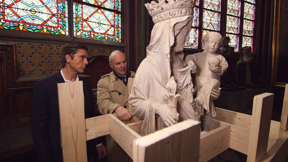 PHOTO: ABC News' David Muir walks through the fire-damaged Notre Dame cathedral in Paris with retired French General Jean-Louis Georgelin in May 2019, nearly a month after a devastating fire.