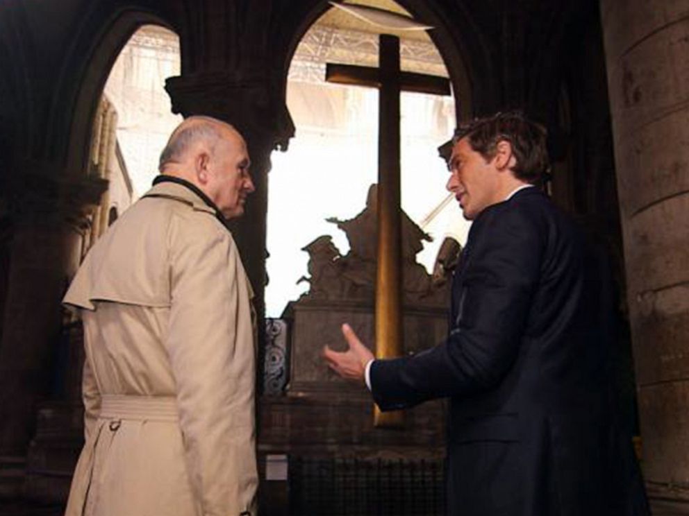 PHOTO: ABC News David Muir walks through the fire-damaged Notre Dame cathedral in Paris with retired French General Jean-Louis Georgelin in May 2019, nearly a month after a devastating fire.