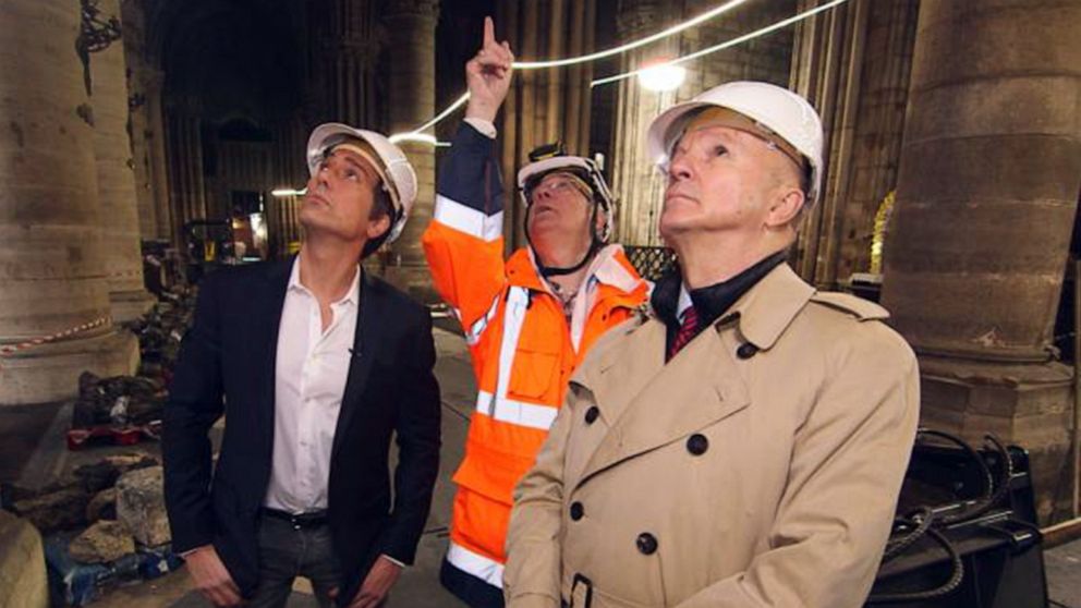 PHOTO: ABC News' David Muir walks through the fire-damaged Notre Dame cathedral in Paris with retired French General Jean-Louis Georgelin in May 2019, nearly a month after a devastating fire.