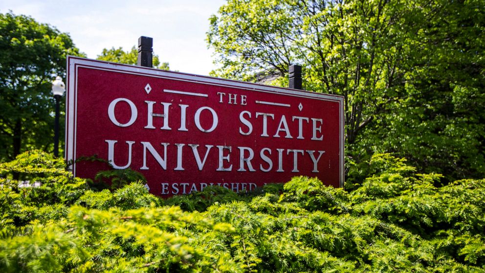 FILE - This May 8, 2019, photo, shows a sign for The Ohio State University in Columbus, Ohio. Ohio State University has won its fight to trademark the word "The." The U.S. Patent and Trademark Office approved the university's request Tuesday, June 21