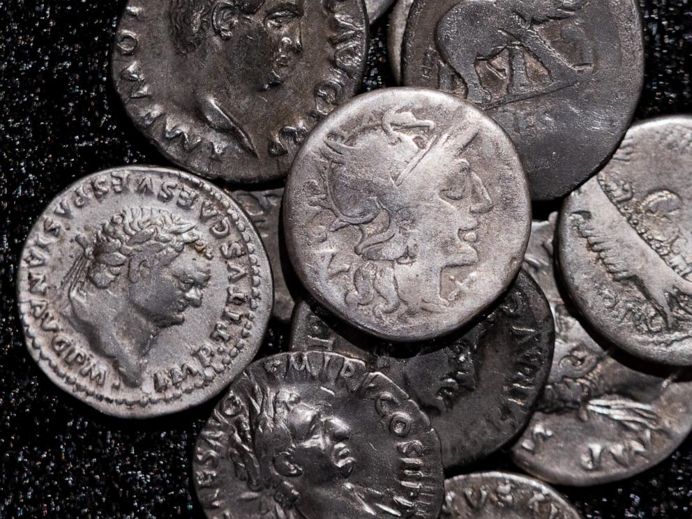 Amateur archaeologist finds Germany’s biggest hoard of ancient Roman silver coins