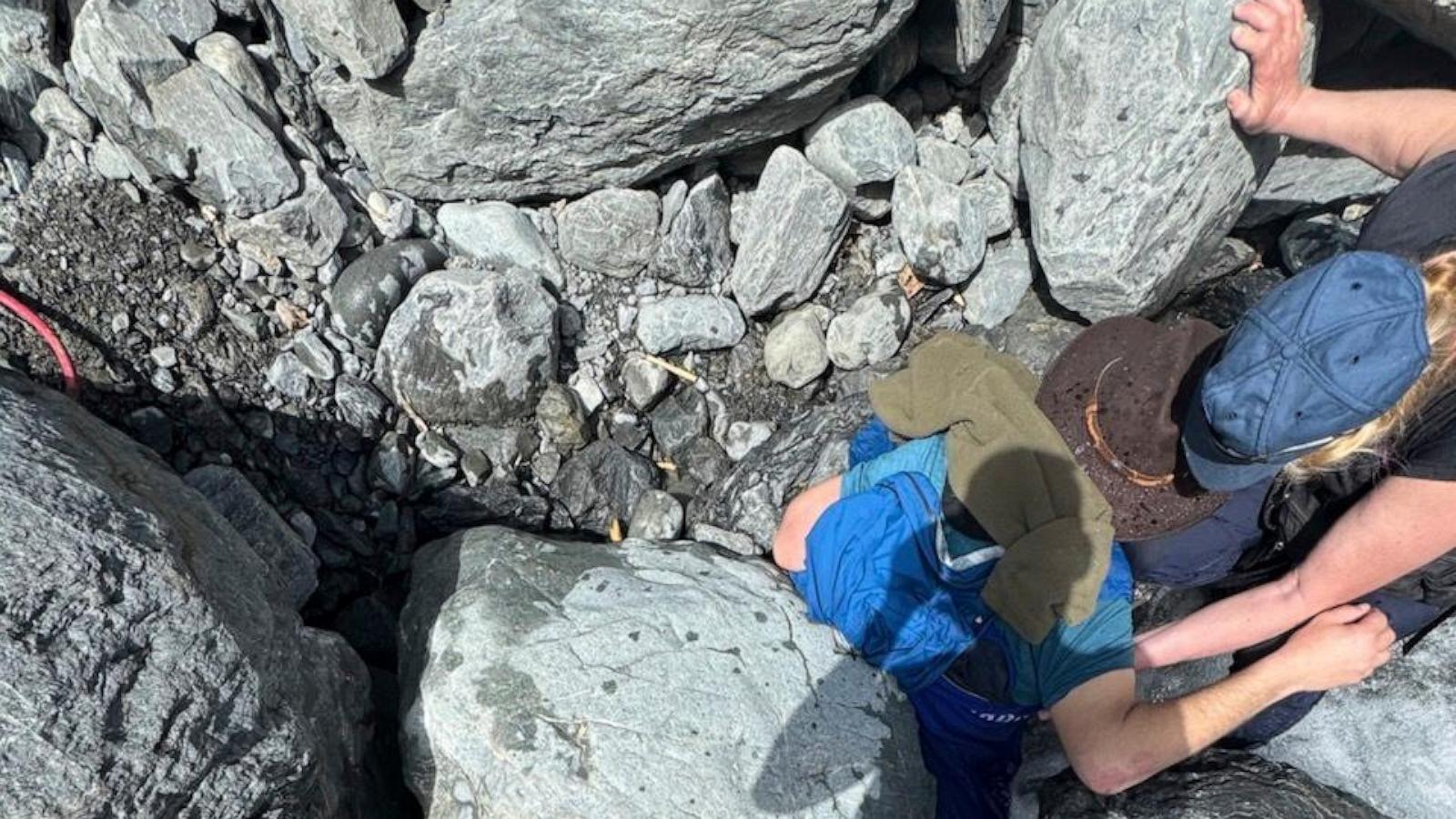 A 700-pound boulder pins Alaska man face-down in a glacier creek for three hours