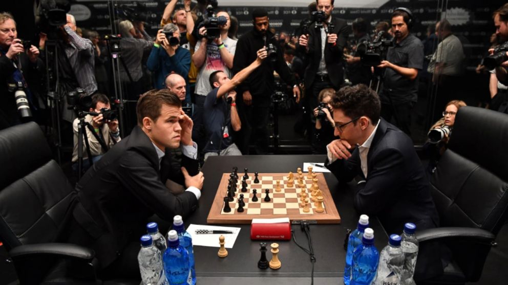 Carlsen presses but held to draw in world chess championship match's first  game - Washington Times